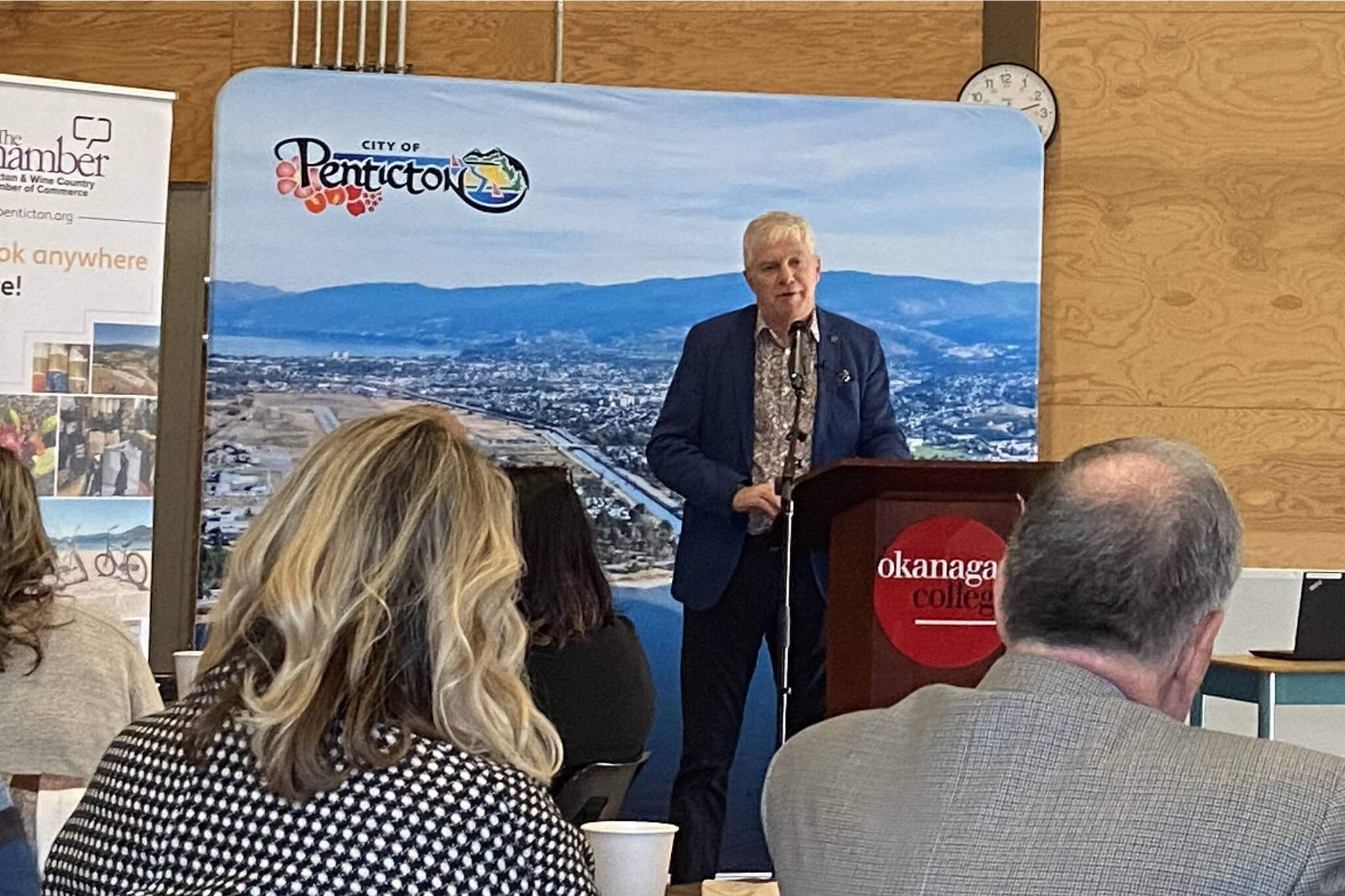 Penticton mayor Julius Bloomfield addresses a large crowd at a Chamber held meeting at Okanagan College on March 8. The new mayor addressed housing, community safety and touched on the budget. (Monique Tamminga Western News)
