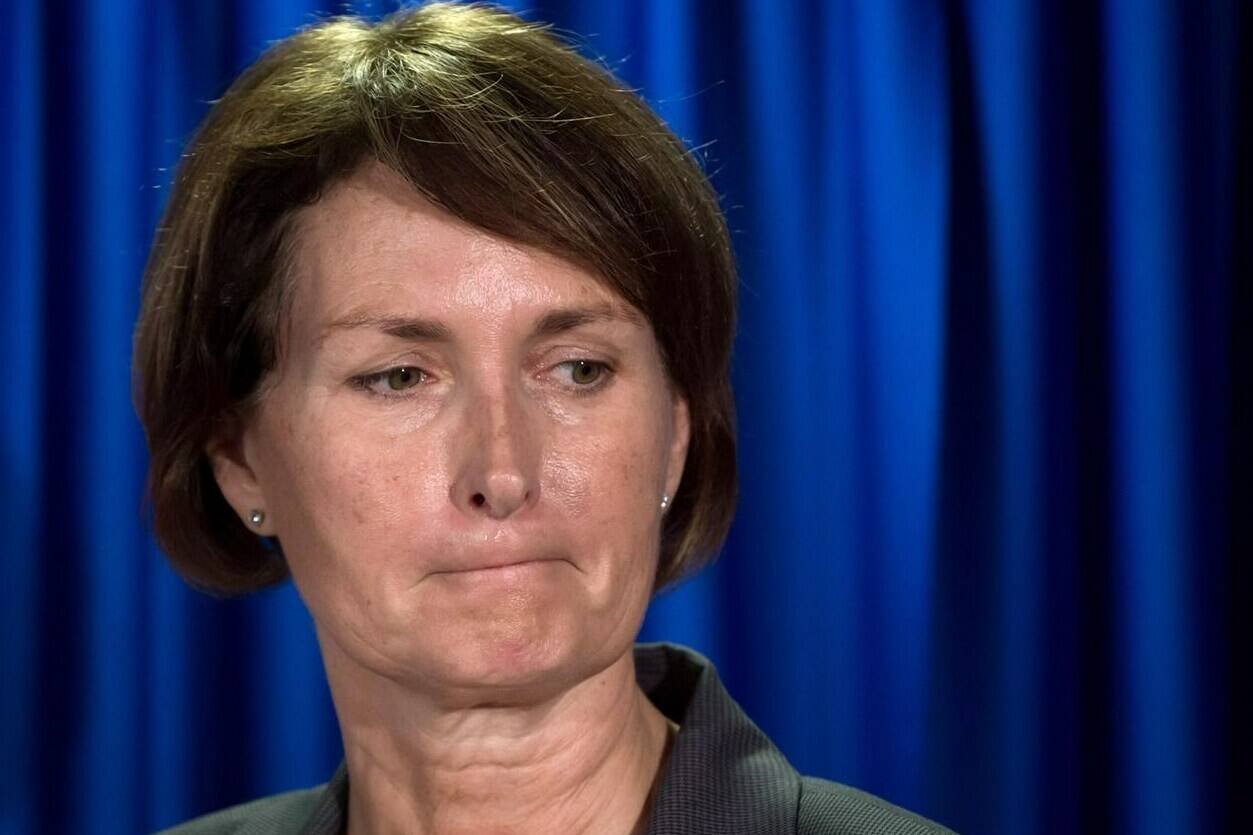 B.C. Representative for Children and Youth Mary Ellen Turpel-Lafond listens during a news conference after releasing a joint report with the B.C. Information and Privacy Commissioner about cyberbullying, in Vancouver, B.C., on Friday November 13, 2015. Another award has been stripped from Turpel-Lafond, the former judge, law professor and British Columbia representative for children and youth whose claims of Indigenous ancestry have been discredited. THE CANADIAN PRESS/Darryl Dyck