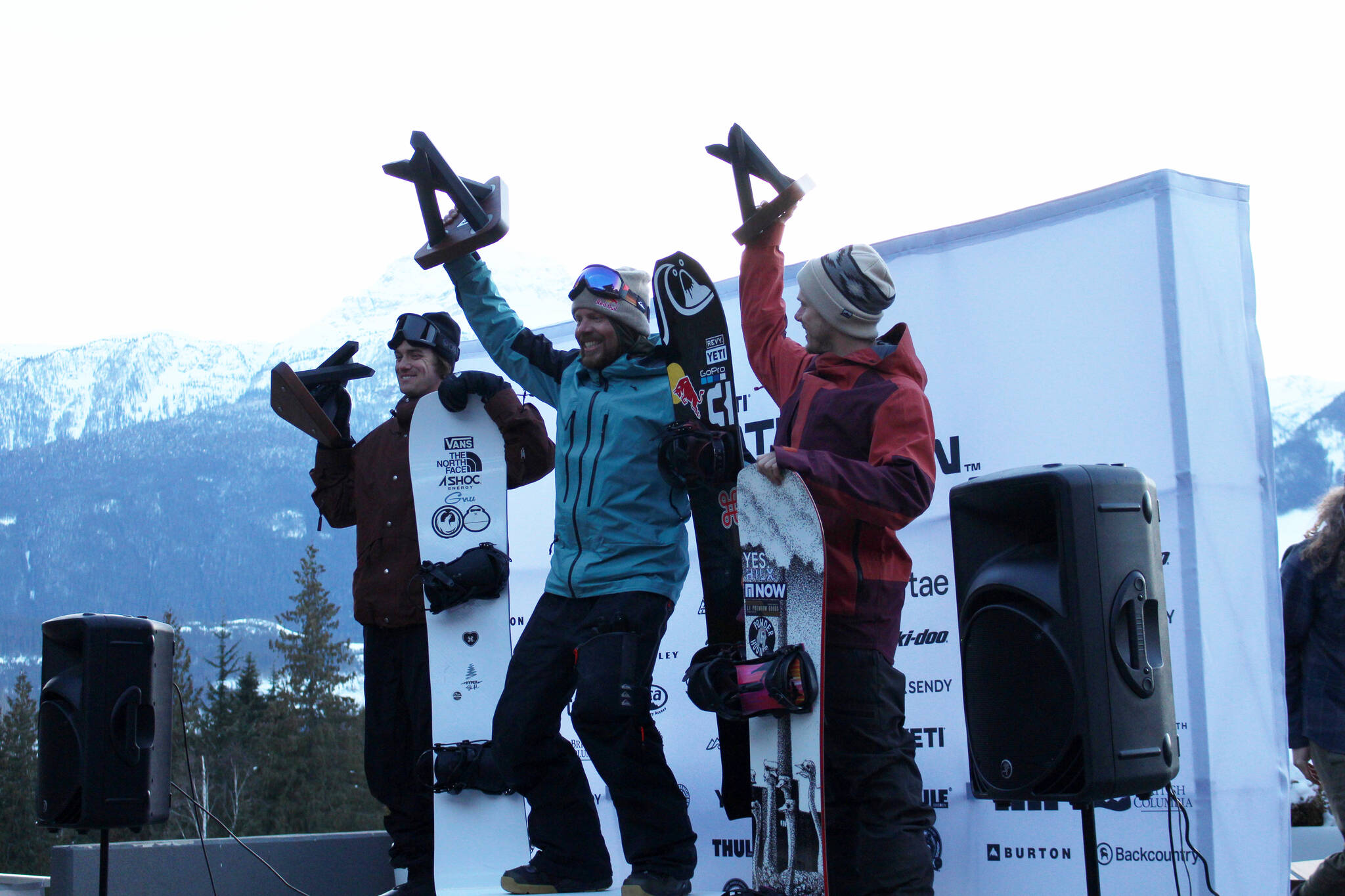 Blake Paul, Travis Rice, and Dustin Craven on the podium after the YETI Natural Selection Tour. (Josh Piercey/Revelstoke Review)