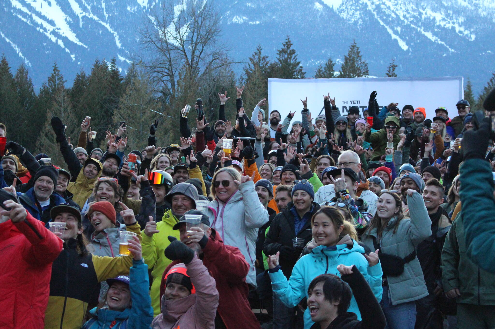 The crowd with the athletes at Rockford Plaza on Mar. 8. (Josh Piercey/Revelstoke Review)