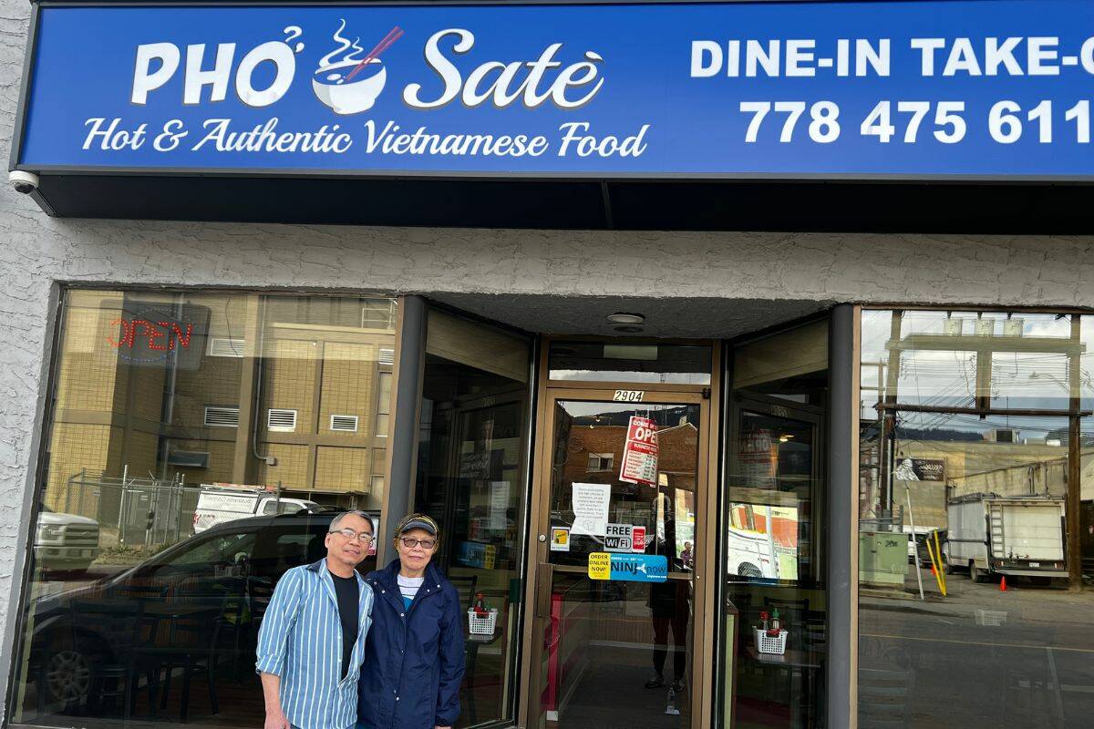 Owners Minh and Yen Nguyen pose in front of their store, Pho Sate. (Bowen Assman photo)