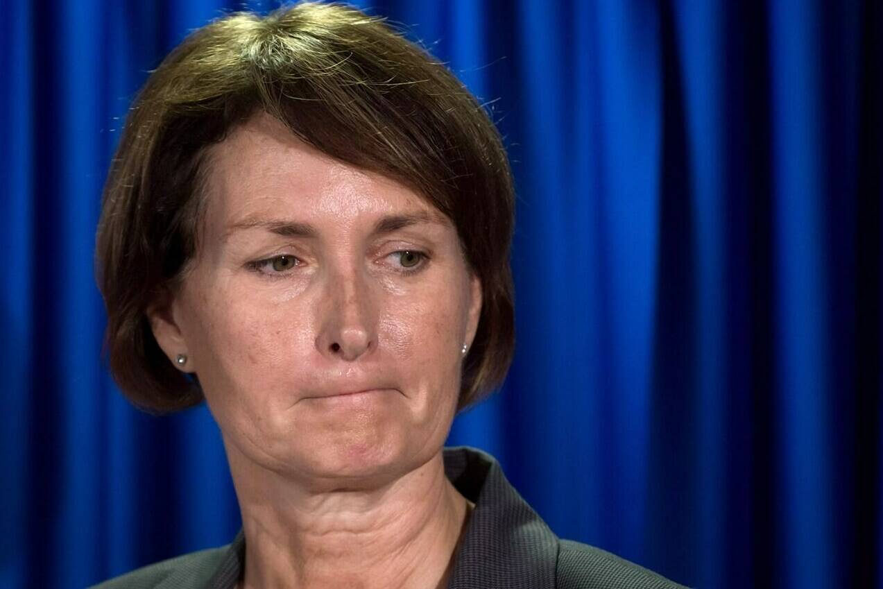 B.C. Representative for Children and Youth Mary Ellen Turpel-Lafond listens during a news conference after releasing a joint report with the B.C. Information and Privacy Commissioner about cyberbullying, in Vancouver, B.C., on Friday November 13, 2015. Another award has been stripped from Turpel-Lafond, the former judge, law professor and British Columbia representative for children and youth whose claims of Indigenous ancestry have been discredited. THE CANADIAN PRESS/Darryl Dyck