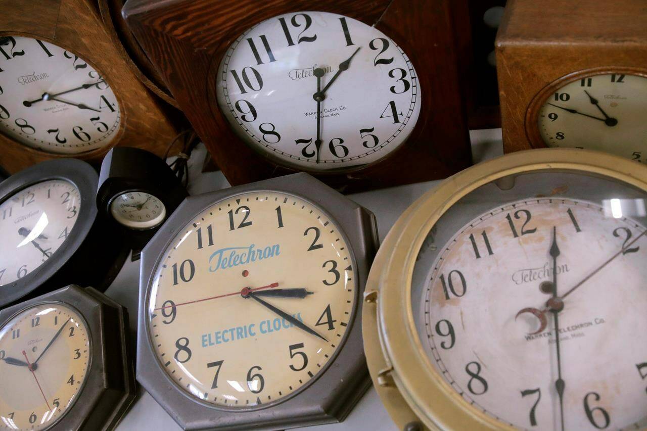 Antique clocks are displayed at the Electric Time Company, in Medfield, Massachusetts on March 5, 2020. U.S. legislation that could trigger an end to seasonal time changes in Canada is moving forward again, as Canadians get ready to wind their clocks ahead an hour before going to bed Saturday night. THE CANADIAN PRESS/AP, Charles Krupa