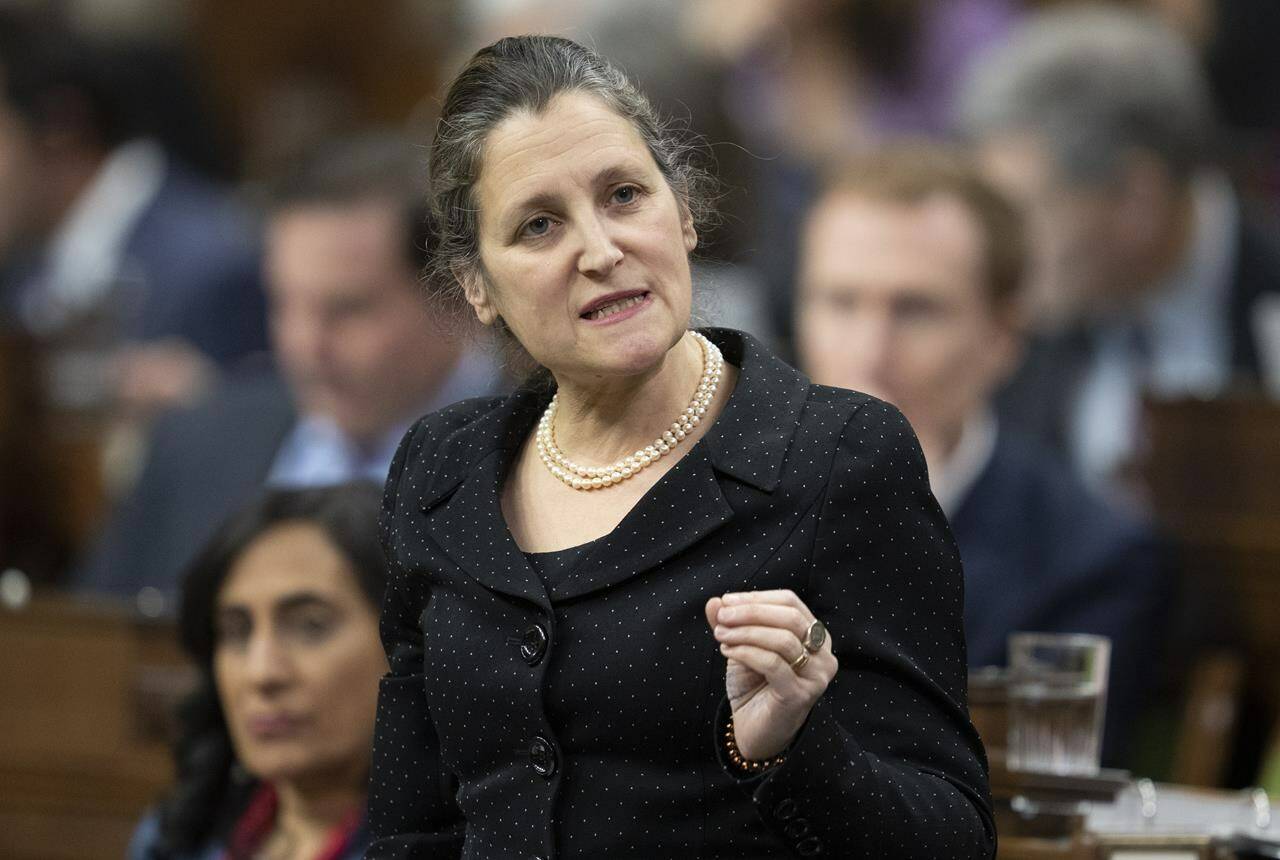 Deputy Prime Minister and Finance Minister Chrystia Freeland rises during Question Period, Monday, January 30, 2023 in Ottawa. THE CANADIAN PRESS/Adrian Wyld