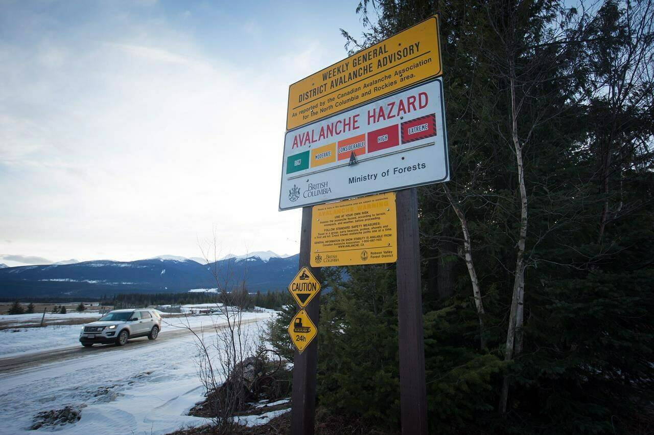 An avalanche hazard warning of “considerable” is shown near Mount Renshaw outside of McBride, B.C., on Saturday, Jan. 30, 2016. Avalanche Canada has released more details about the deadly avalanche that killed three German citizens in southeastern British Columbia last week.THE CANADIAN PRESS/Darryl Dyck