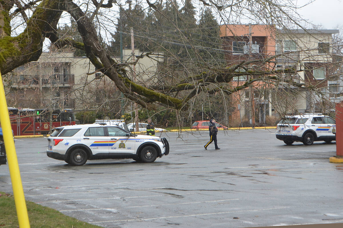 RCMP vehicles in the parking lot of the former White Spot restaurant along Terminal Avenue following a shooting Sunday, March 12. (Mandy Moraes/News Bulletin)