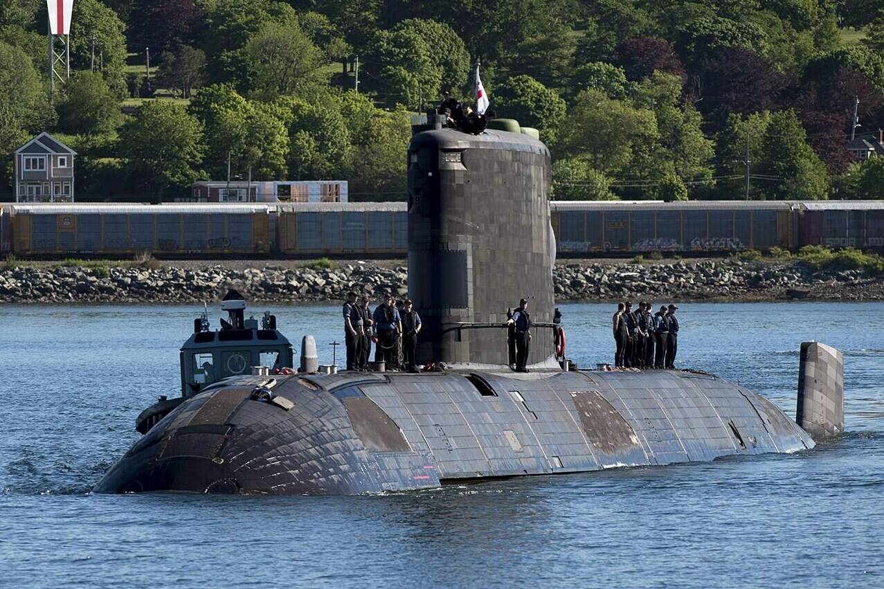 HMCS Windsor, one of Canada’s Victoria-class long range patrol submarines, returns to port in Halifax on June 20, 2018. The clock is ticking for the Canadian military to decide whether to replace its submarines, as Canada’s closest allies push ahead with plans to build new fleets. THE CANADIAN PRESS/Andrew Vaughan