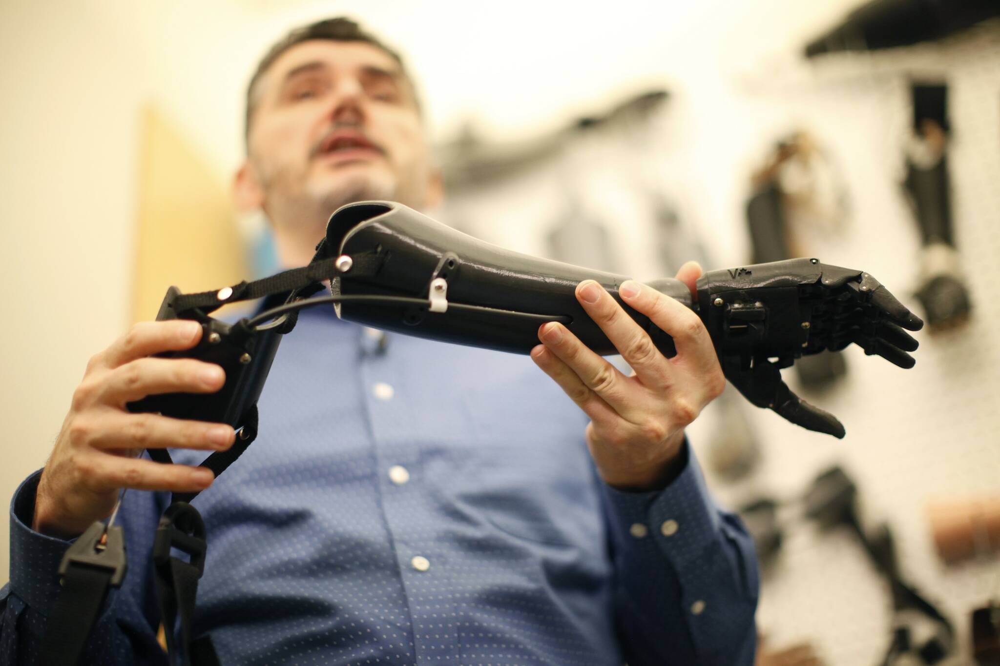 Mechanical engineering professor Nick Dechev talks about a prosthetic limb made from using a 3D-printer and polylactic acid for amputees and kids in Canada and the US part of the Victoria Hand Project in the engineering lab wing at the University of Victoria in Victoria, B.C., on Tuesday, December 3, 2019. THE CANADIAN PRESS/Chad Hipolito
