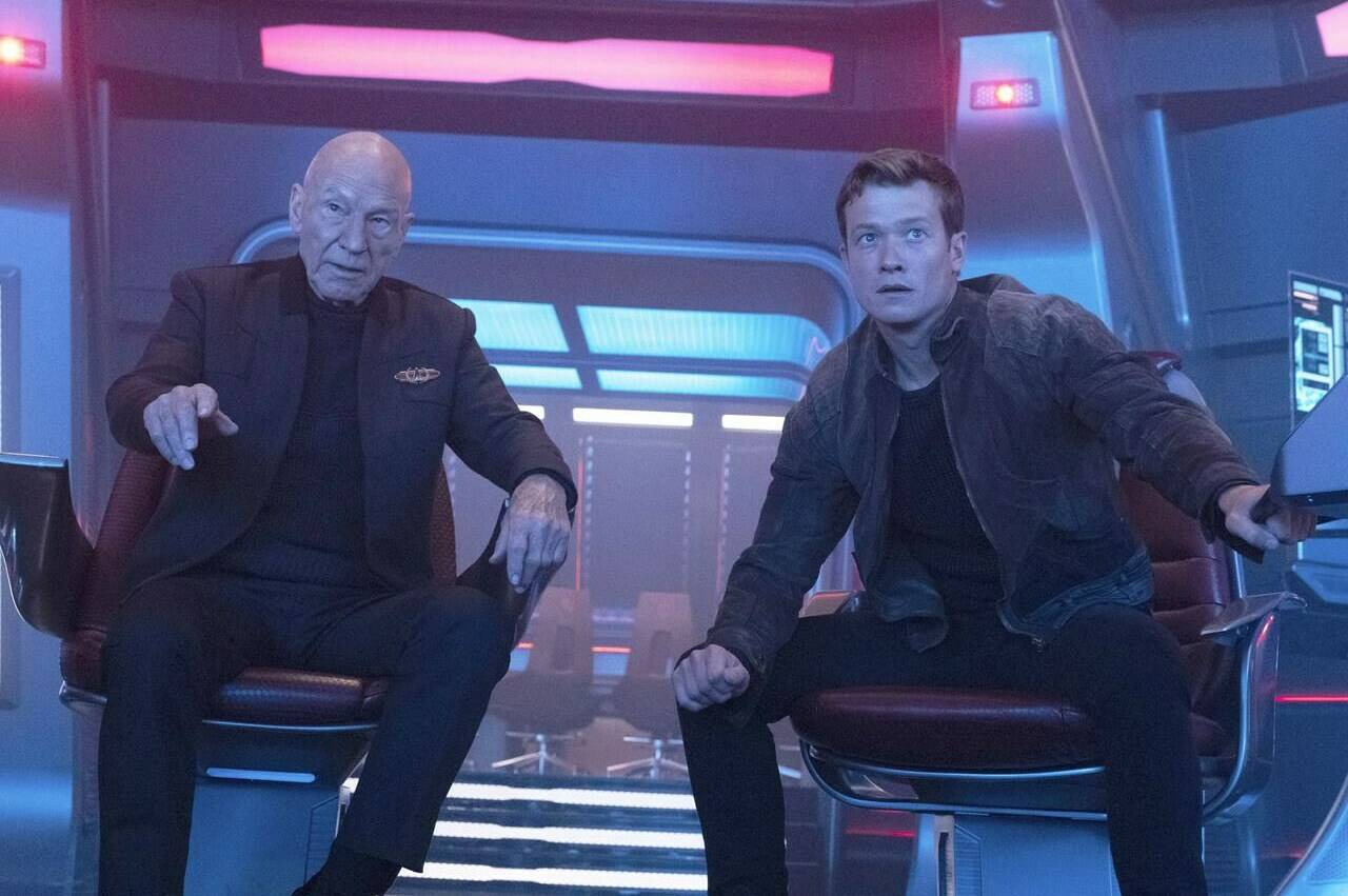 This image released by Paramount+ shows Patrick Stewart as Picard, left, and Ed Speleers as Jack Crusher in the “No Win Scenario” episode of “Star Trek: Picard.” (Trae Patton/Paramount+ via AP)