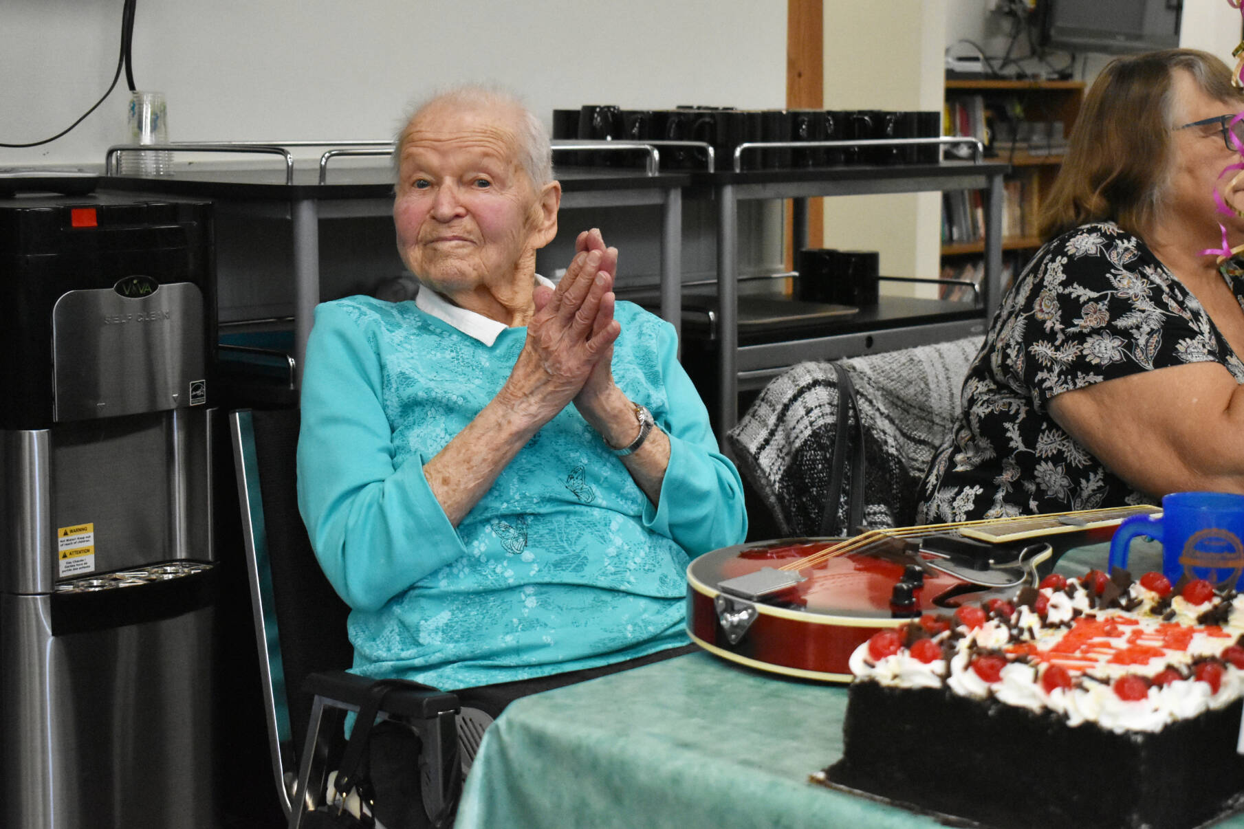 Alli Graham enjoys her 99th birthday party at the Sicamous and District Seniors Centre March 15, 2023. (Rebecca Willson/ Eagle Valley News)