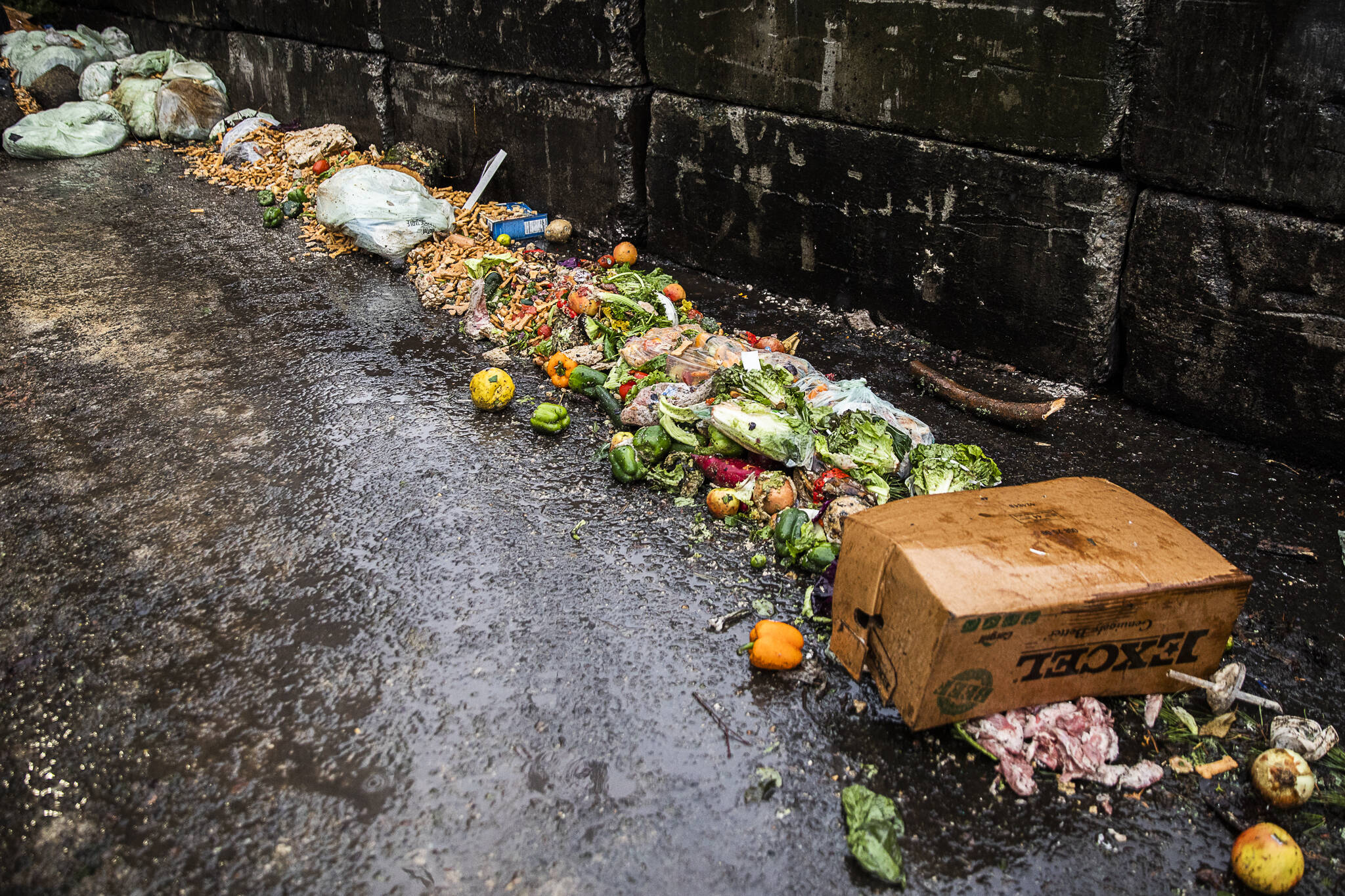 Food waste lines the edge of the tipping building at Cedar Grove Composting on Thursday, Jan. 12, 2023 in Everett, Washington. (Olivia Vanni / The Herald)