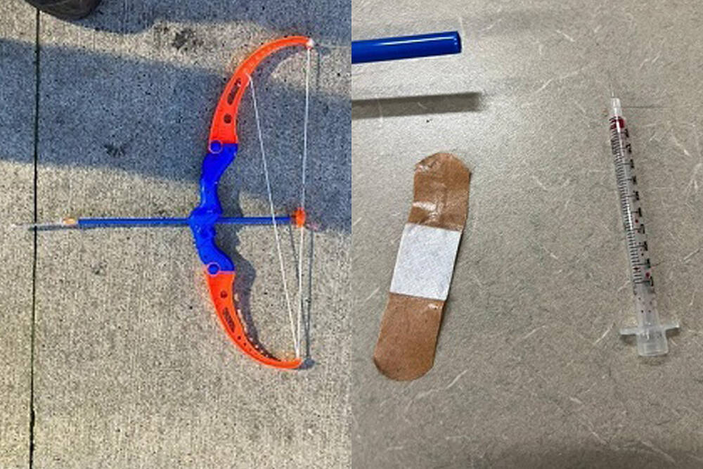 A suspect was arrested for making threats while brandishing a toy bow and arrow with a syringe attached. (Photos submitted)