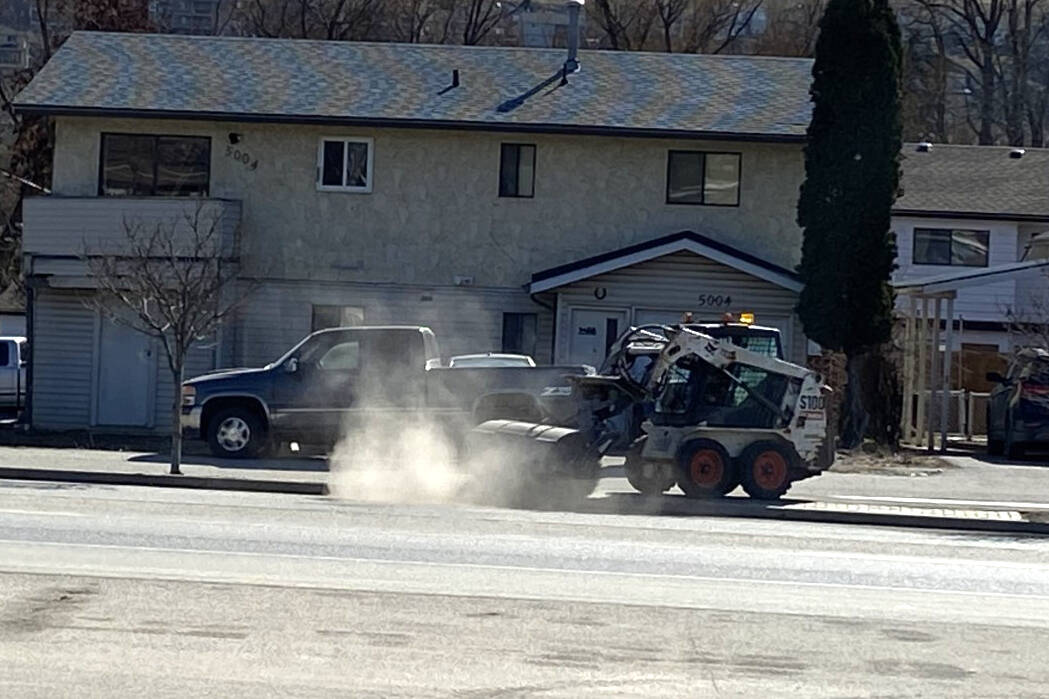 A city of Vernon bobcat sweeper cleans boulevards along 25th Avenue Wednesday, March 15. (Jennifer Smith - Morning Star)