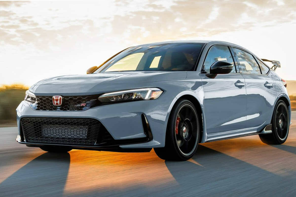 The Civic Type R has wider track – the distance between the left and right wheels — than the standard Civic, so the fenders are flared to cover the tires. The Type R is front-wheel-drive, but the Toyota GR Corolla, the Volkswagen Golf R and the Subaru WRX are all-wheel-drive. PHOTO: HONDA