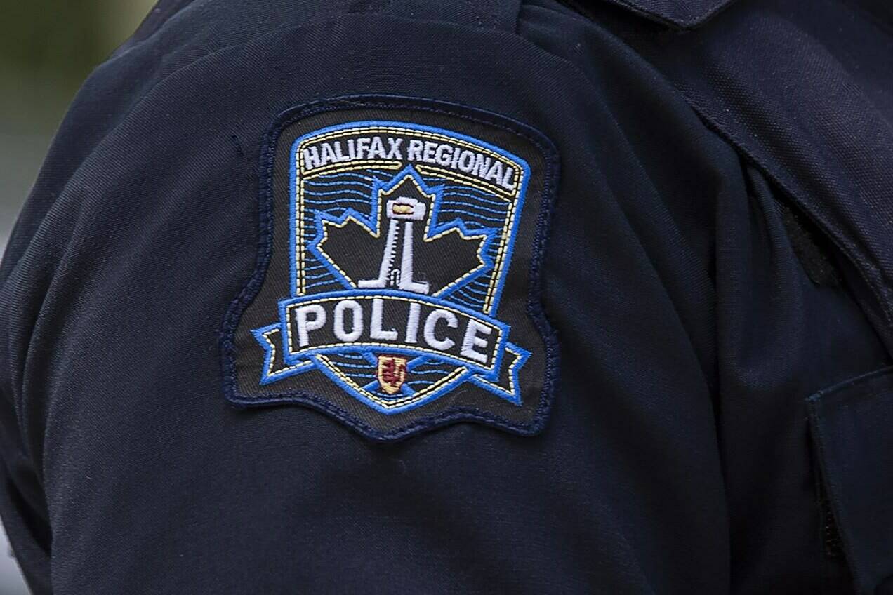 A Halifax Regional Police emblem is seen on a police officer in Halifax on July 2, 2020. Halifax police say a student was arrested after three people were stabbed this morning at a high school in the Bedford area. THE CANADIAN PRESS/Andrew Vaughan