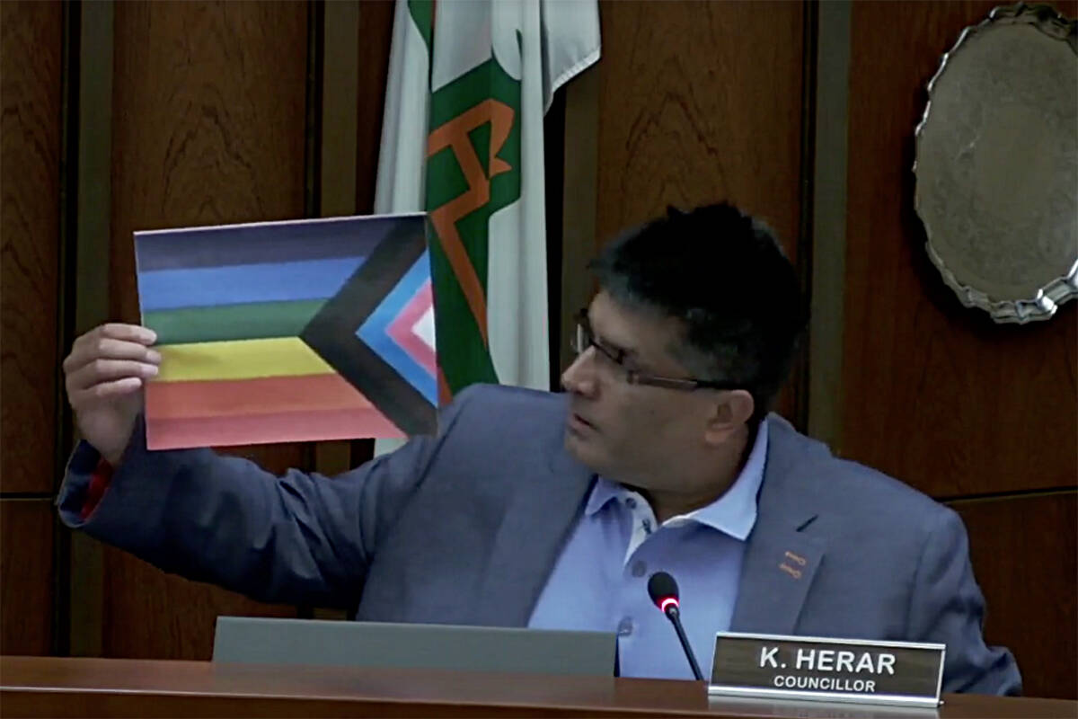 Councillor Ken Herar shows off the Pride Progress Flag at council on June 6, 2022. The matter was revisited on Monday (March 20) with the council voting to move forward without flying the pride flag at municipal locations. /Screenshot from Mission council