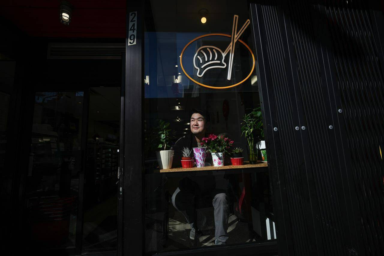 William Liu, a second-generaton co-owner of Kam Wai Dim Sum, poses for a photograph at the business in Chinatown, in Vancouver, on Tuesday, March 28, 2023. THE CANADIAN PRESS/Darryl Dyck