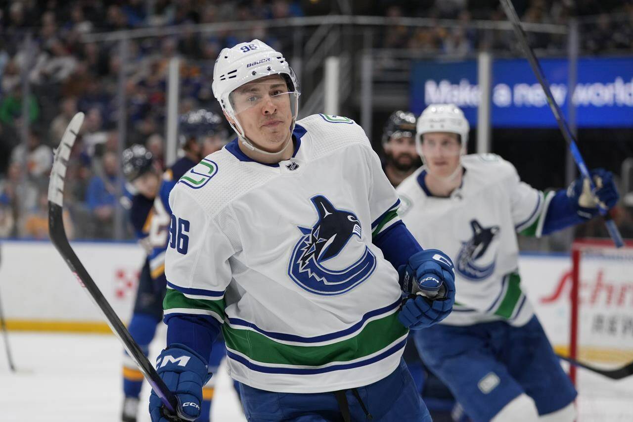 Vancouver Canucks’ Andrei Kuzmenko celebrates after scoring during third period NHL hockey action against the St. Louis Blues Tuesday, March 28, 2023, in St. Louis. Coach Rick Tocchet says Canucks forward Kuzmenko won’t wear a themed warm-up jersey when Vancouver hosts its annual Pride night on Friday. THE CANADIAN PRESS/AP-Jeff Roberson